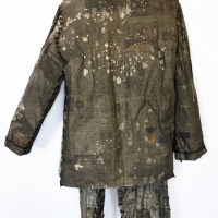 'Jacket/Pants'  • 5' x 3' • Newsprint, Thread, Wheat Paste, Yarn