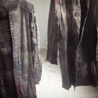 'Coats'  • 5' x 3' • Newsprint, Thread, Wheat Paste, Yarn